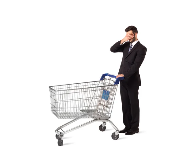 Geschäftsmann mit Einkaufswagen — Stockfoto