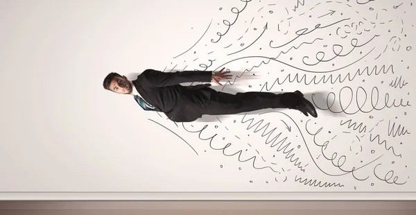 Biznes człowiek latający z ręcznie rysowane linie wychodzi — Zdjęcie stockowe