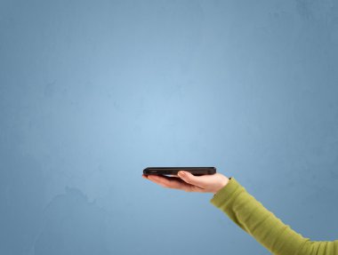 Telefon aygıtı profilden tutuluyor