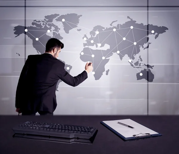 Persona de negocios dibujando puntos en el mapa del mundo — Foto de Stock