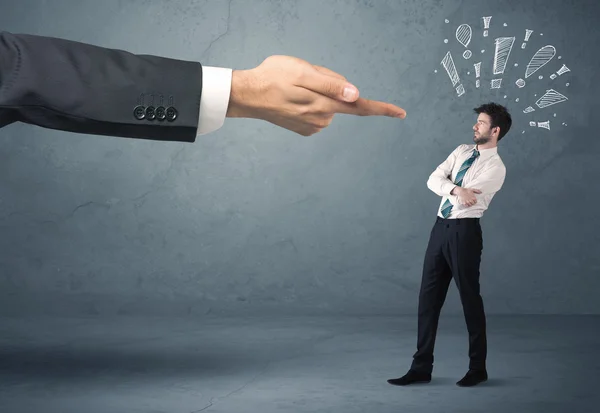 Boss hand firing guilty businessman — Stock Photo, Image