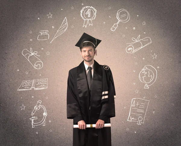 Heureux adolescent diplômé avec des icônes scolaires dessinées à la main — Photo