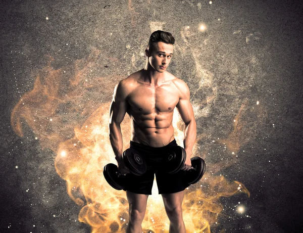 Healthy hot male showing muscles with fire — Stock Photo, Image