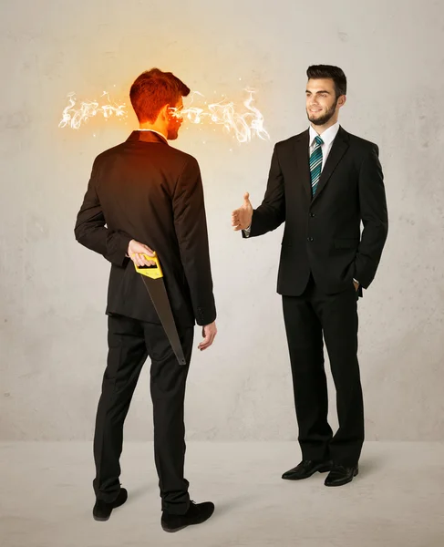 Angry businessman with weapon — Stock Photo, Image