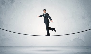 Satış adam sıkı ipe Dengeleme