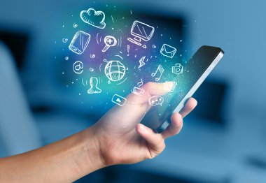 El smartphone Medya simgeler ile tutarak 