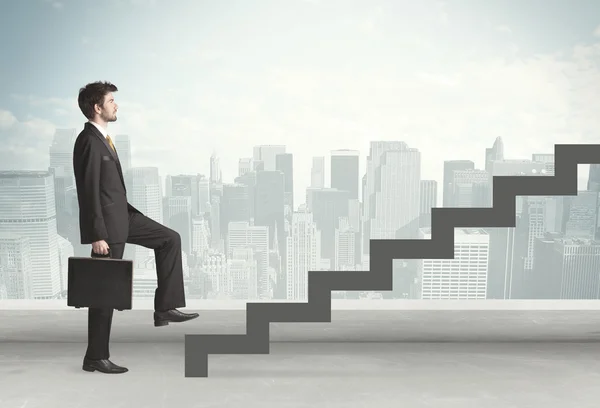 Business person in front of a staircase — Stock Photo, Image