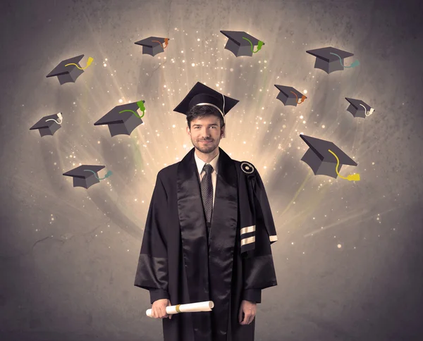 College-Absolvent mit vielen fliegenden Hüten — Stockfoto