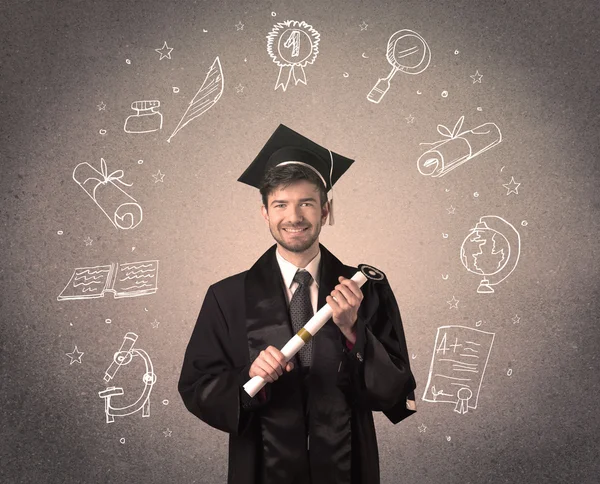 Feliz adolescente graduado com ícones escolares desenhados à mão — Fotografia de Stock