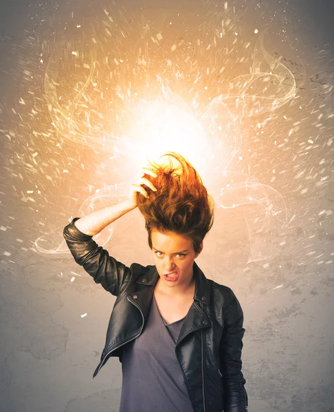 Young woman with energetic exploding red hair — Stock Photo, Image