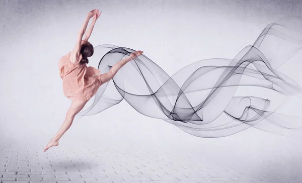 Modern ballet dancer performing with abstract swirl — Stock Photo, Image