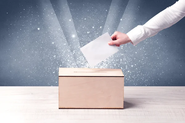 Ballot box with person casting vote — Stock Photo, Image