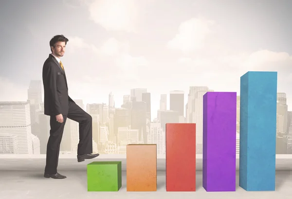 Business person climbing up on colourful chart pillars concept — Stock Photo, Image