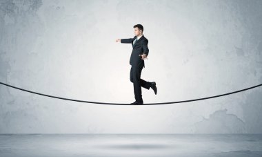 Satış adam sıkı ipe Dengeleme
