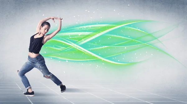 Hip hop dancer posing with green lines — Stock Photo, Image