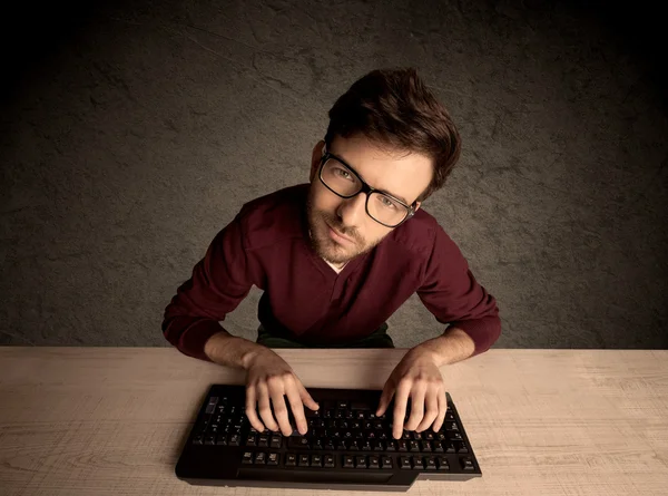 Computer geek typing on keyboard — Stock Photo, Image