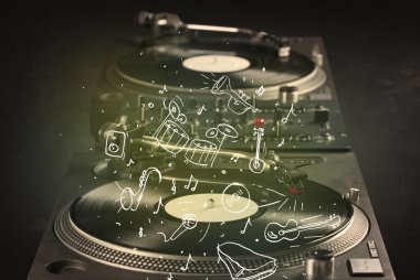 Turntable simge çizilmiş enstrümanlarla klasik müzik çalıyor 
