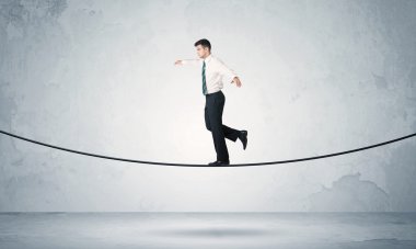 Satış adam sıkı ipe Dengeleme