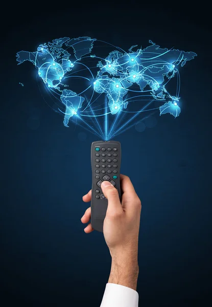 Hand with remote control, social media concept — Stock Photo, Image