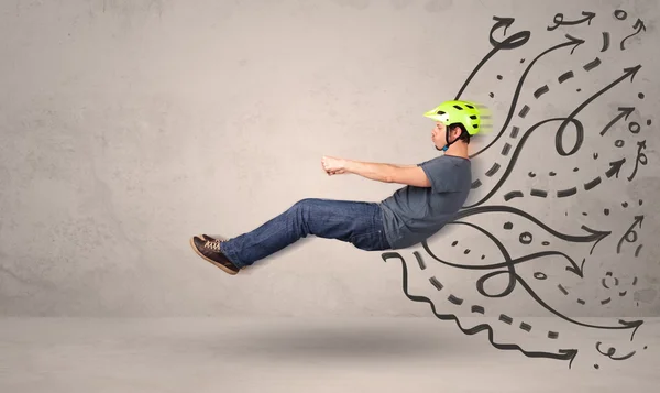Hombre divertido conduciendo un vehículo volador con líneas dibujadas a mano después de h —  Fotos de Stock