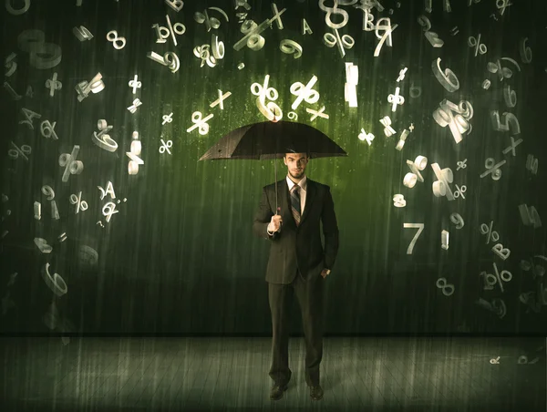 Homme d'affaires debout avec parapluie et numéros 3d pluie concéder — Photo