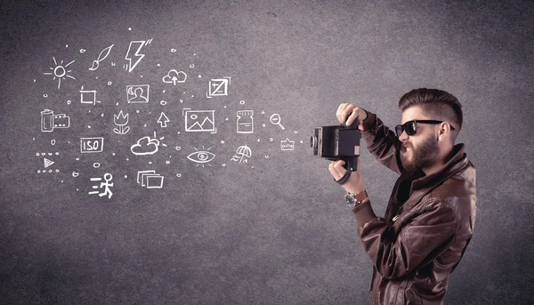 Elegant guy with beard learning photography — Stock Photo, Image