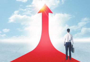 üzerinde kırmızı bir ok ayakta işadamı