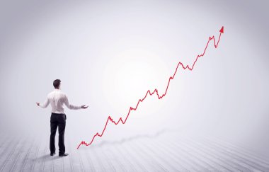 Kırmızı grafik ok ile ayakta işadamı