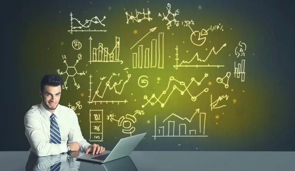 Empresário com diagramas de negócios — Fotografia de Stock