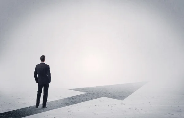 Standing salesman looking ahead with arrow — Stock Photo, Image