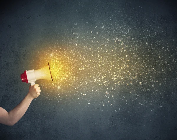 Hand holding megaphone — Stock Photo, Image