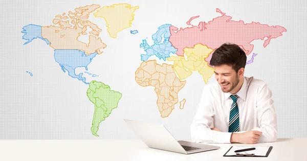 Zakenman met kleurrijke wereldkaart achtergrond — Stockfoto