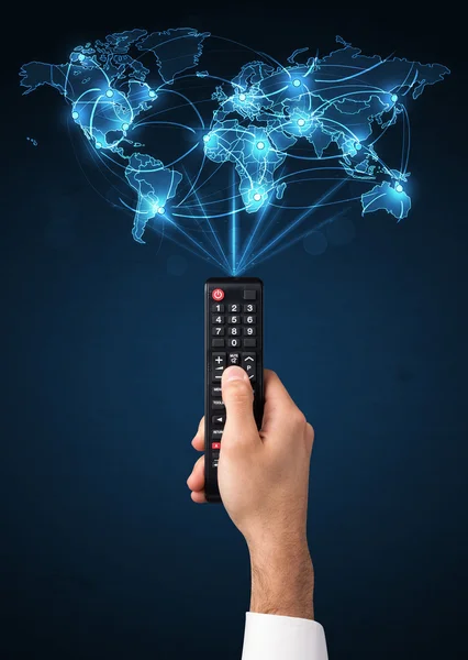 Hand with remote control, social media concept — Stock Photo, Image