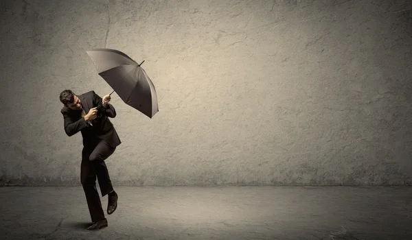 Stilig affärsman som innehar paraply med kopia utrymme bak — Stockfoto