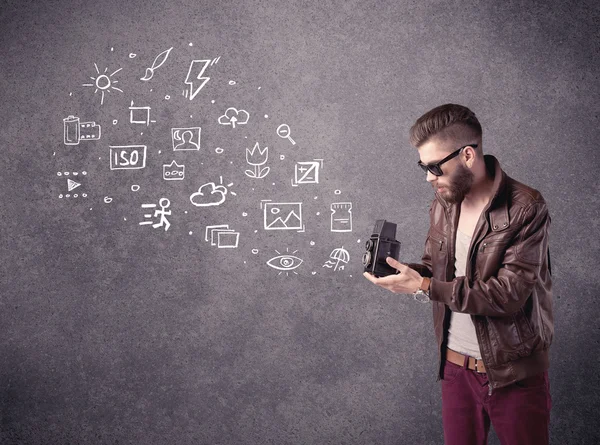 Elegant guy with beard learning photography — Stock Photo, Image