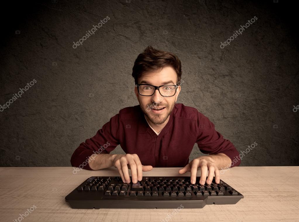 Computer geek typing on keyboard — Stock Photo © ra2studio 109261404