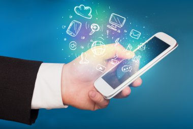 El smartphone Medya simgeler ile tutarak 