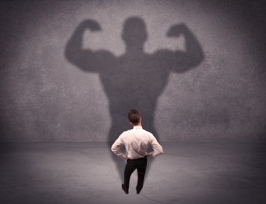 Güçlü gölgesi olan başarılı bir iş adamı.