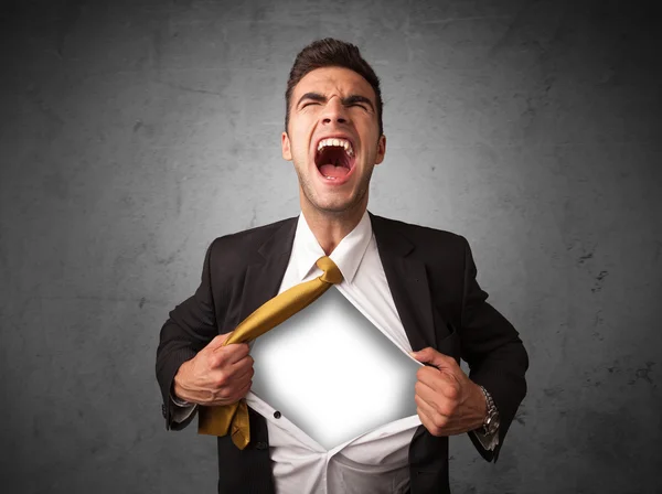 Businessman tearing off his shirt with white copyspace on chest — Stock Photo, Image