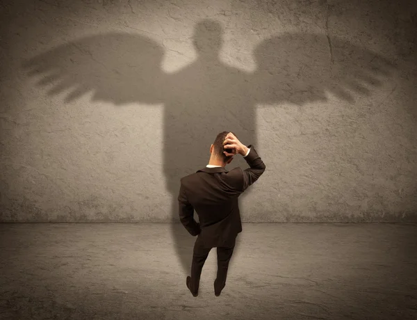 Vendedor honesto com conceito de sombra de anjo — Fotografia de Stock