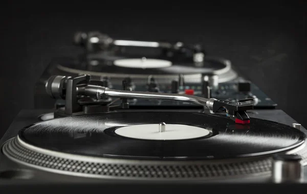 Turntable playing vinyl close up with needle on the record — Stock Photo, Image