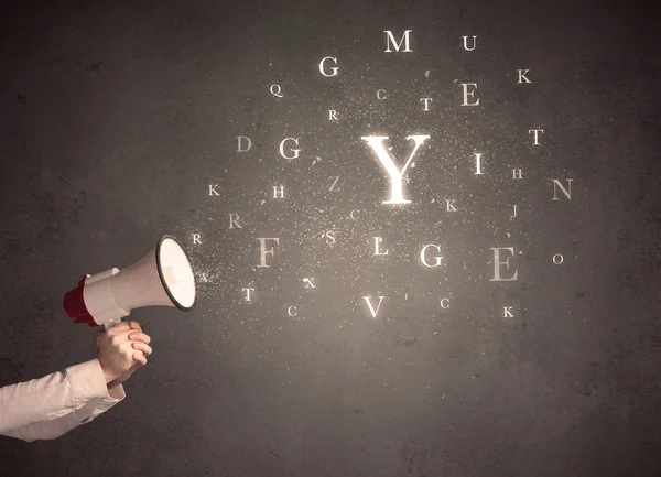 Megaphone with letters — Stock Photo, Image