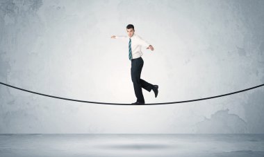 Satış adam sıkı ipe Dengeleme