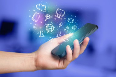 El smartphone Medya simgeler ile tutarak 