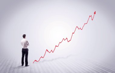 Kırmızı grafik ok ile ayakta işadamı