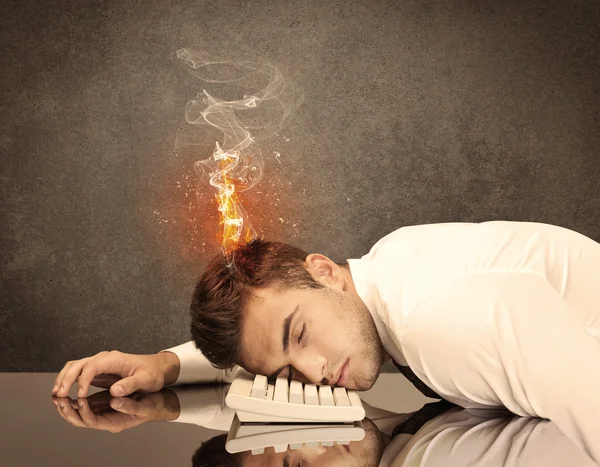 Sad business person's head catching fire — Stock Photo, Image