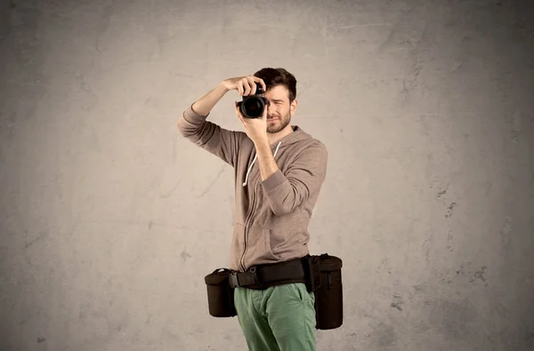 Hobby photographer holding camera — Stock Photo, Image