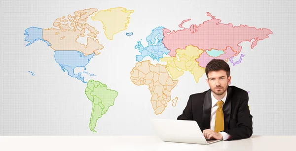Zakenman met kleurrijke wereldkaart achtergrond — Stockfoto