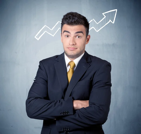 Smiling business guy with graph arrow — Stock Photo, Image