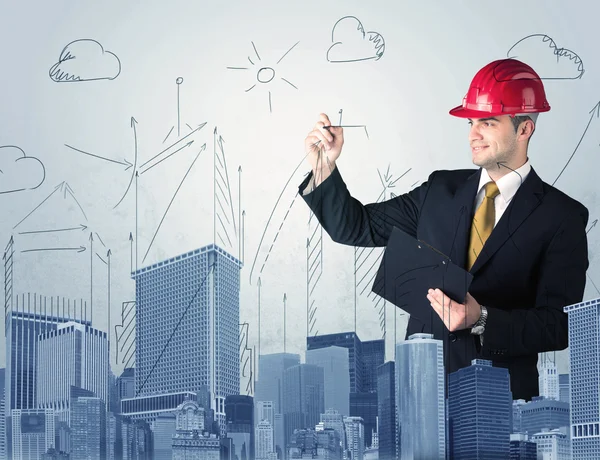 Joven trabajador dibujando una ciudad vista — Foto de Stock